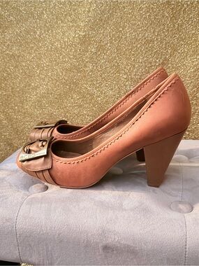 BCBGeneration Peach-Pink Mid Heel Pumps with Buckle Accent